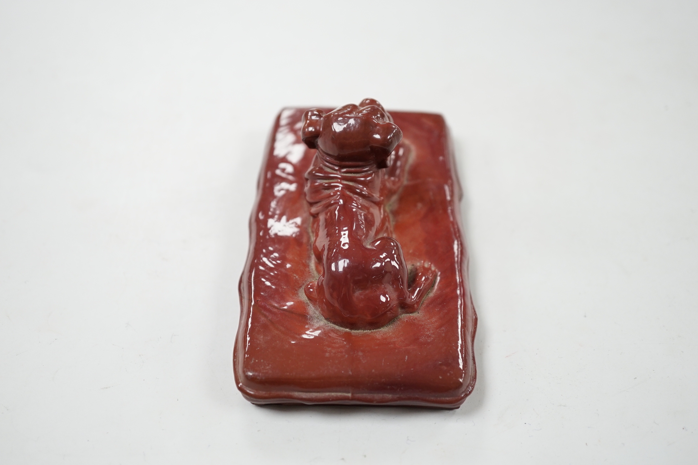 A German ‘agate’ glass model of a dog, 11.5cm wide